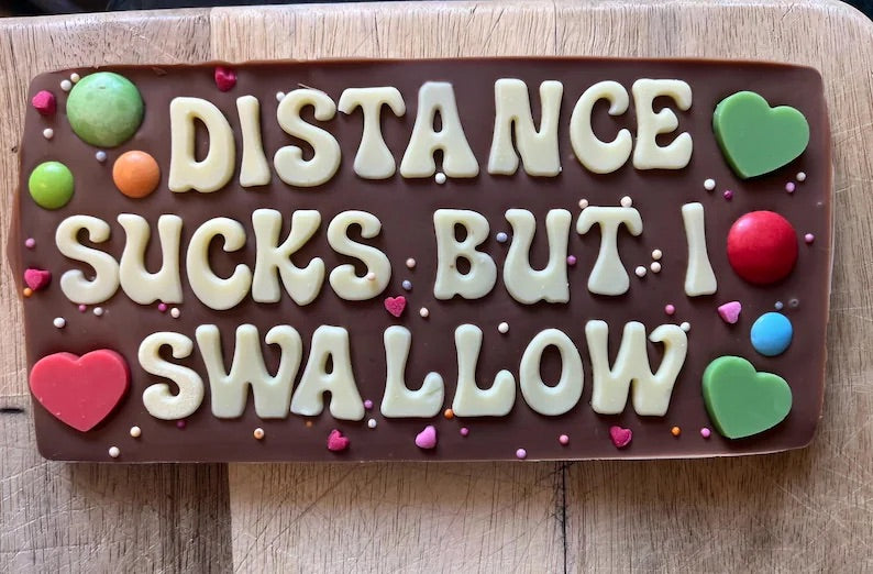 Distance sucks but I swallow chocolate slab