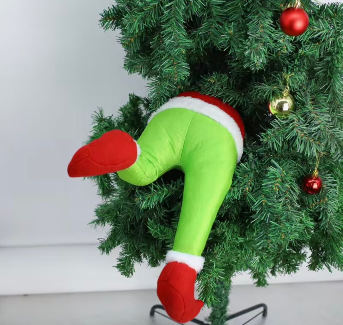 Christmas Decorations Featuring Santa Claus with Green Fake Legs