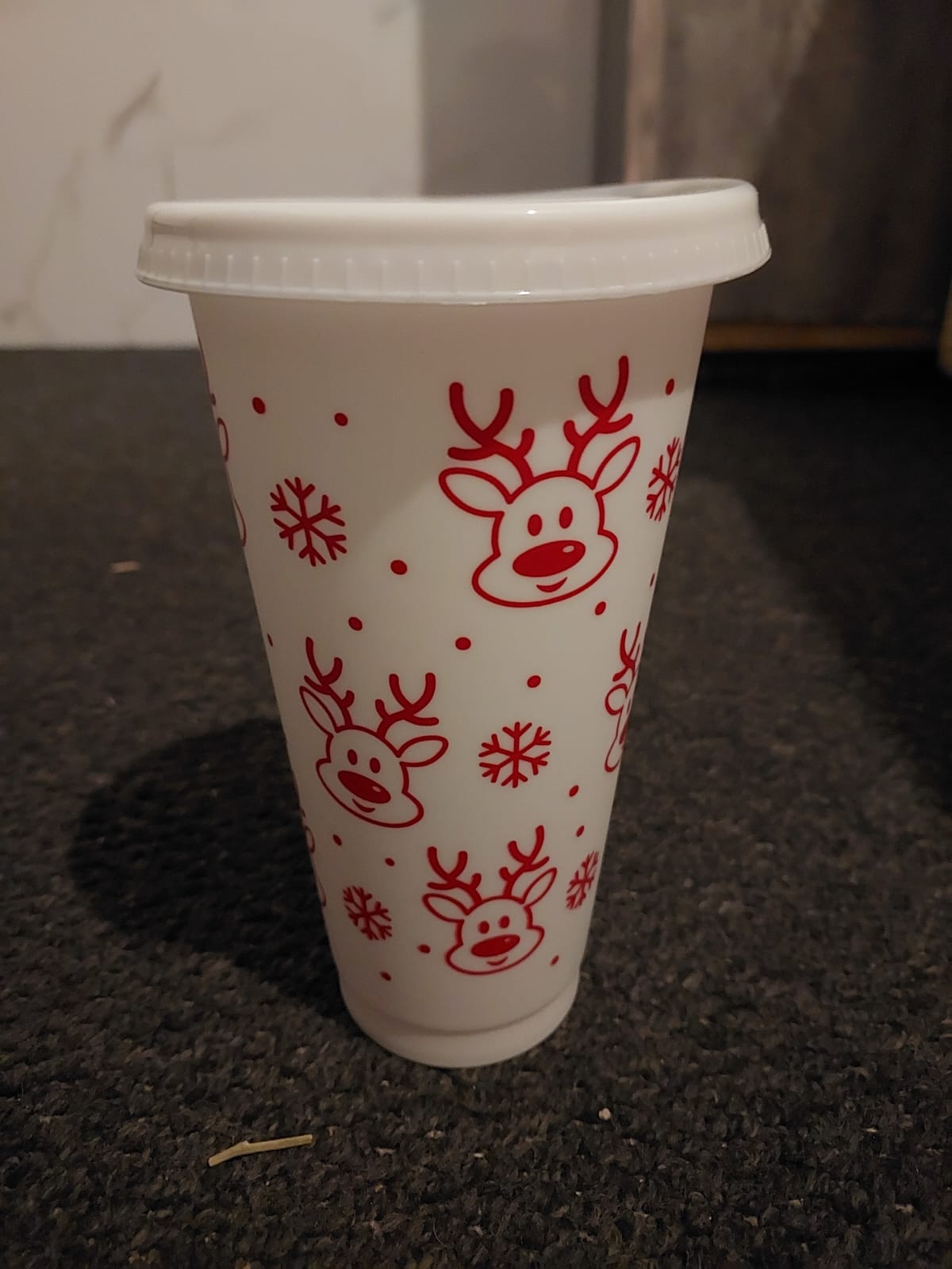 Reindeer faces cold cup