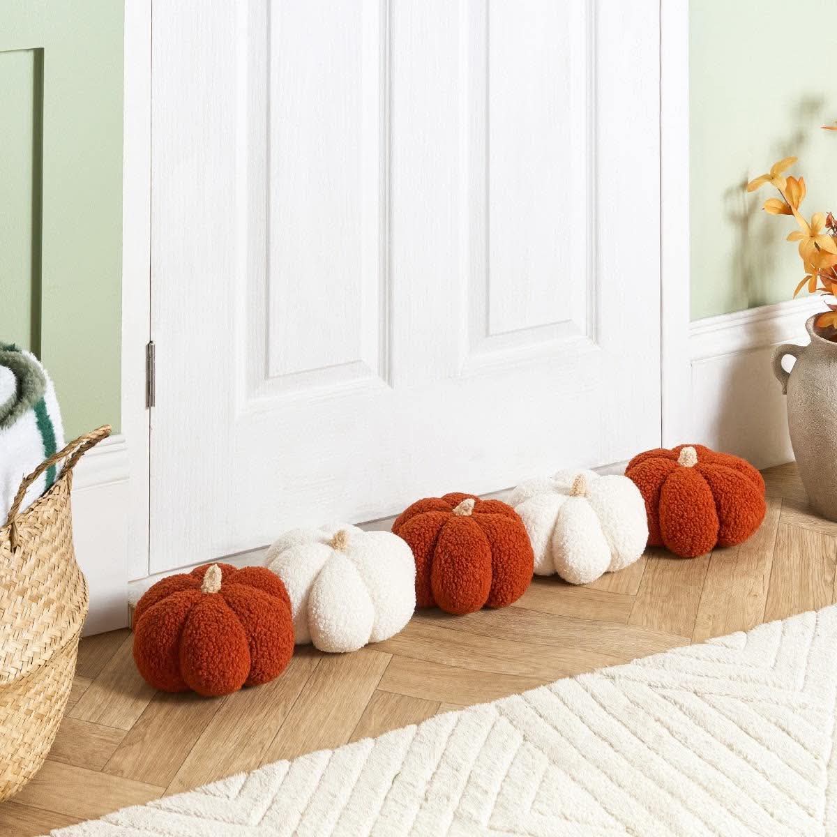Boucle pumpkin shaped draught excluder - rust/white