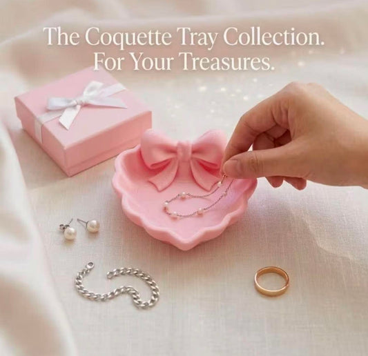 A Heart-Shaped Jewelry Tray with a Pink Bow