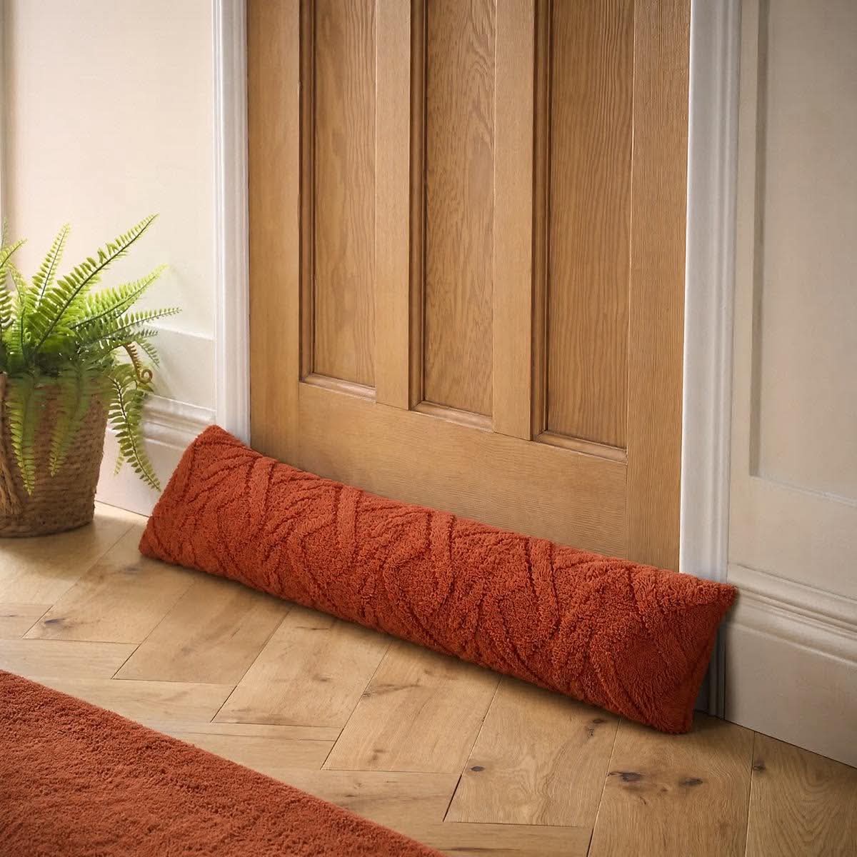 Cable knit draught excluder - Rust